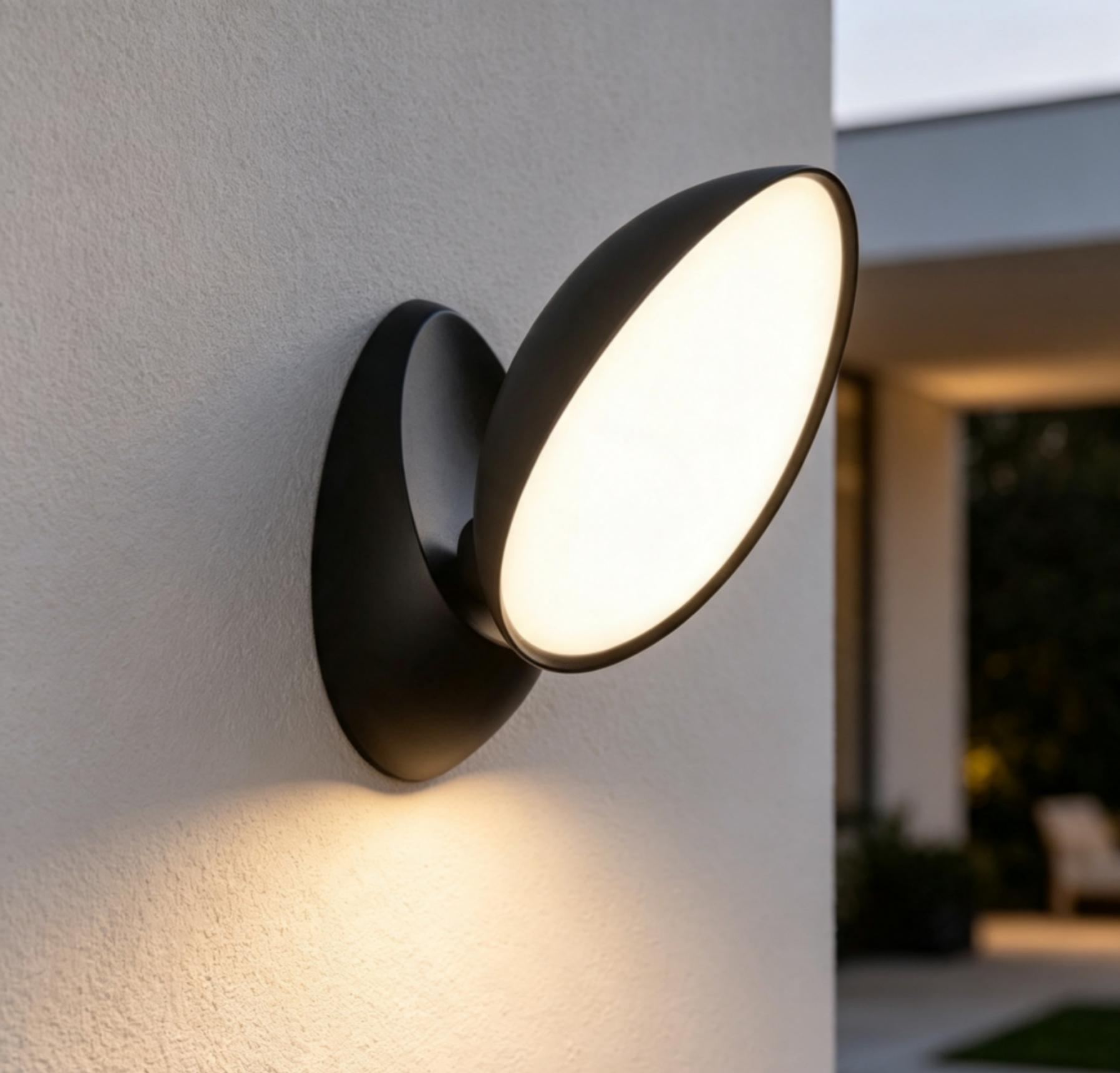Detail of a circular wall fixture and its warm diffuser